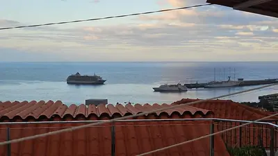 two boats in the water in the ocean at Bela Vista House in Funchal