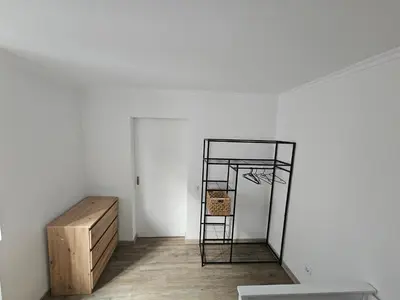 a room with a ladder and a dresser in it at Bela Vista House in Funchal