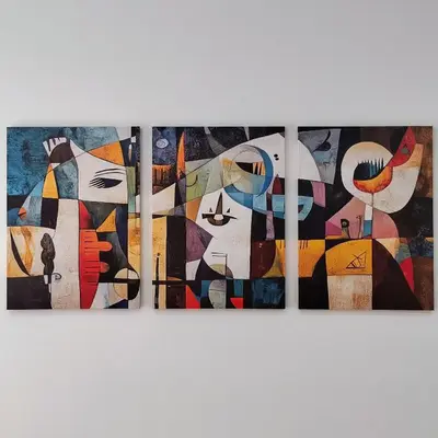 a group of four paintings on a wall at Sol I in Funchal