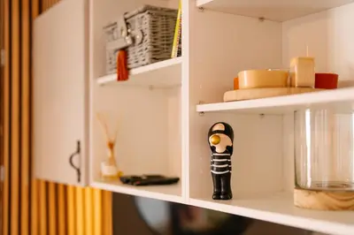 a shelf with a figurine in a kitchen at Magnolia Terrace by Amazing Madeira in Funchal
