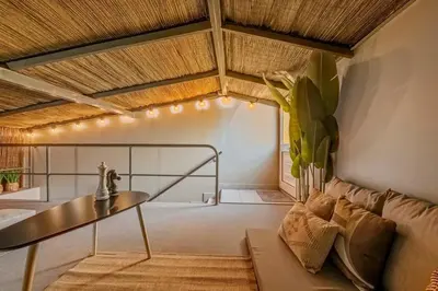 a living room with a couch and a table at SUPER Rabbit in Funchal