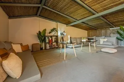 a living room with a couch and a table at SUPER Rabbit in Funchal