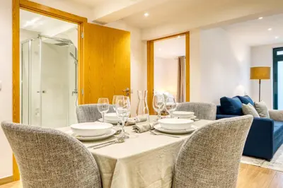 a dining room with a table and chairs at Casa do Pinheiro II, a Home in Madeira in São Vicente