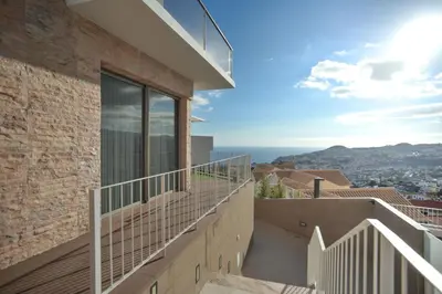 a view from the balcony of a house at Villa Amazing View Funchal - Lux & Pool in Funchal