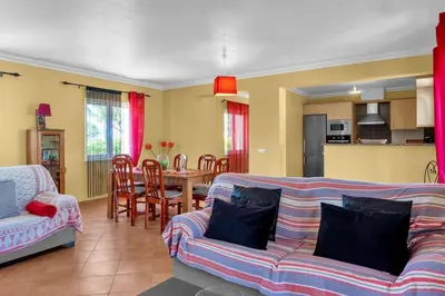 a living room with a couch and a table at L40 Villa & Pool- Vale da Telha, Aljezur in Aljezur