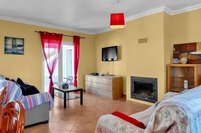 a living room with a tv and a fireplace at L40 Villa & Pool- Vale da Telha, Aljezur in Aljezur