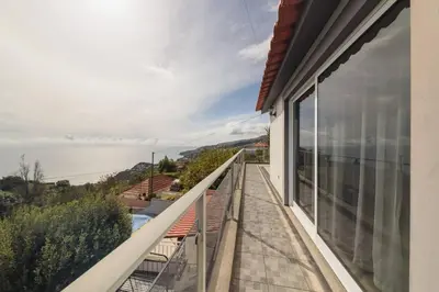 a balcony with a view of the water at Vivenda Carlota Sea View by Mth in Ribeira Brava