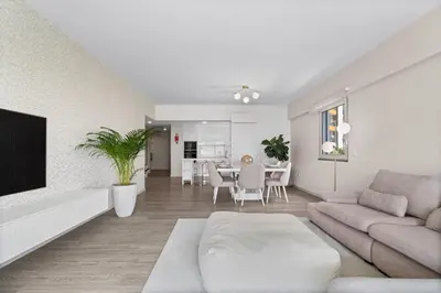a living room with a couch and a table at Atlantic View by An Island Apart in Funchal