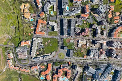 an overhead view of a city with buildings and roads at Atlantic View by An Island Apart in Funchal