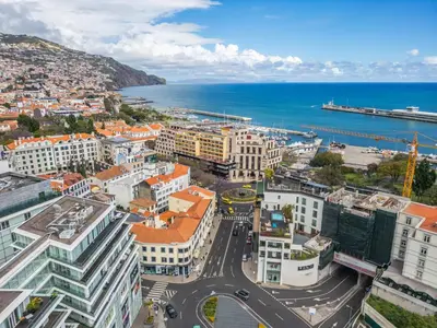 an aerial view of a city with the ocean at SeaSide Serenity in Funchal
