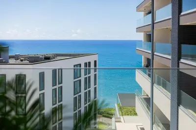 a view of the ocean from a building at Satoshi Ocean View in Funchal