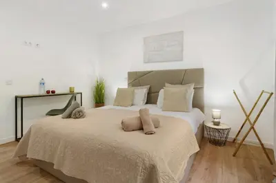 a bedroom with a bed with two stuffed animals on it at Casa Belavista in Gaula