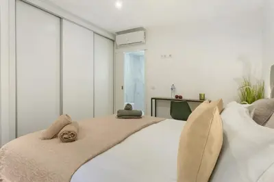 a bedroom with a large bed with two stuffed animals on it at Casa Belavista in Gaula
