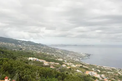 a view of a town on a hill next to the water at Casa Belavista in Gaula