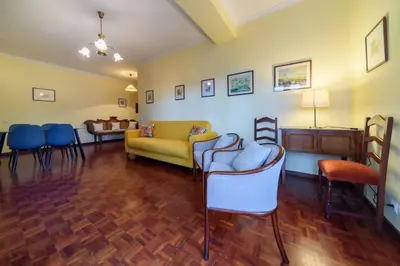 a living room with chairs and a couch at Casa Branca Apartment by Mth in Funchal