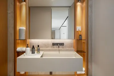 a bathroom with a white sink and a mirror at Giluca Retreat in Funchal