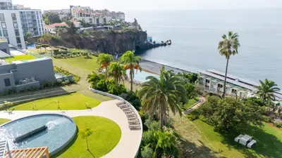 an aerial view of the ocean and a resort at Acqua Mar in Funchal