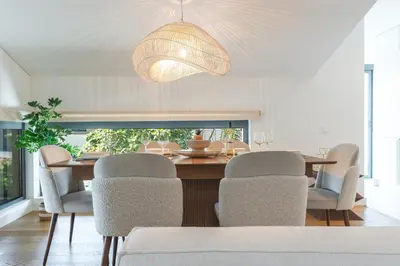 a dining room with a table and chairs at Babi by the Sea by Atlantic Holiday in Funchal