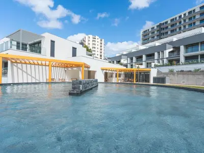 a swimming pool in the middle of a building at Babi by the Sea by Atlantic Holiday in Funchal