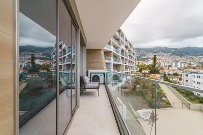 an apartment balcony with views of the city at GuestReady - The perfect view in Funchal in Funchal
