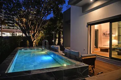 a swimming pool in the backyard of a house at Acqua - Private Swimming Pool in Funchal