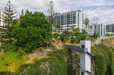 an aerial view of a city with tall buildings at Acqua - Private Swimming Pool in Funchal