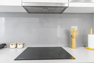 a kitchen with a counter top with a stove top at Green Living-Funchal in Funchal