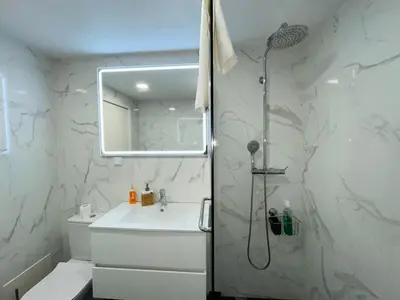 a bathroom with a shower and a sink at Piornais Apartment by Susys Holidays in Funchal