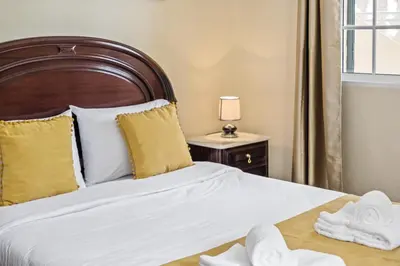 a bedroom with a bed with towels on a table at Valley Nest by Zest and Guest in Ribeira Brava