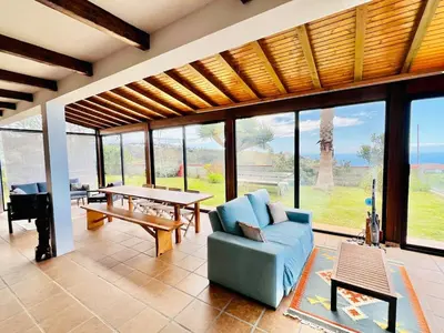 a bedroom with a large bed in a room at Oasis in Madeira by YMR in Raposeira do Logarinho