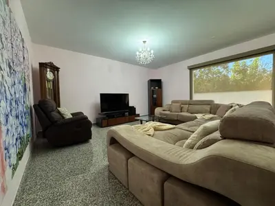 a living room with two couches and a television at Villa Salinas in Paul do Mar