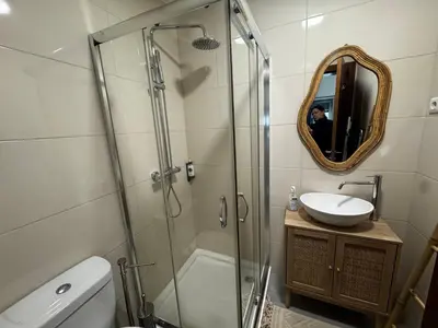 a bathroom with a glass shower and a sink at São Pedro Paradise A UP in Funchal