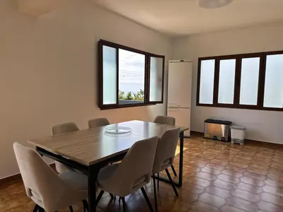 a dining room with a table and chairs at Anita & Leonel's House A in Gaula