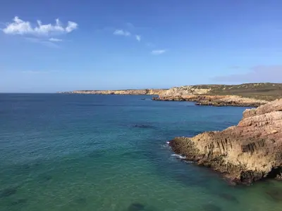 an aerial view of a body of water with rocks at Casa da Ingrina in Raposeira