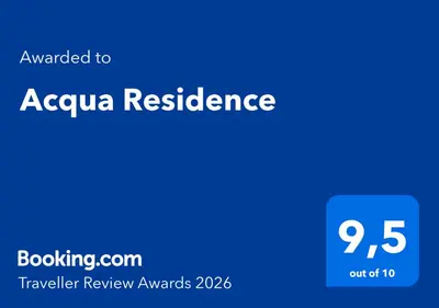a blue sign with the words koza resilience at Acqua Residence in Funchal