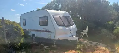 a white truck parked on the side of the road at Pauls Mobile Home in Baro de So Joo, Portugal in Barão de São João
