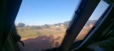a view of a field from a train window at Pauls Mobile Home in Baro de So Joo, Portugal in Barão de São João
