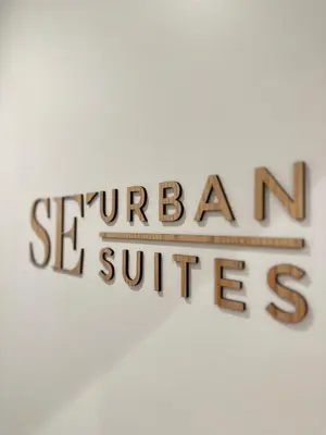 a sign that reads sebago services on a wall at Sè Urban Suite 21 in Funchal