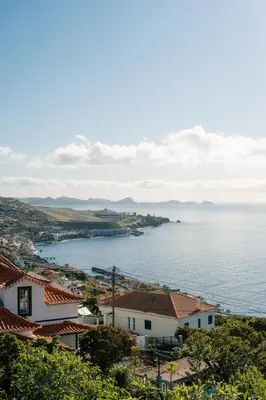 a view of the ocean from a town at Sunrise House by Wanderlust Madeira - 2 Bedroom Sea View in Gaula