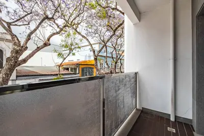 a view from the balcony of a building with a bus at Urban Stay 1B by Homie in Funchal