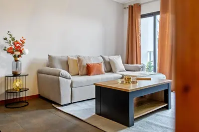 a living room with a couch and a table at Urban Stay 1A by Homie in Funchal