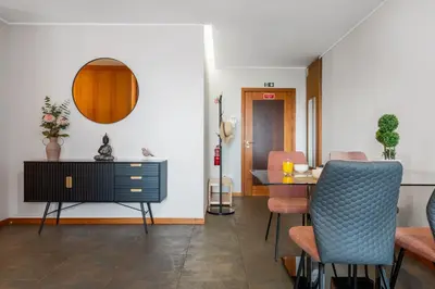 a living room with a table and chairs at Urban Stay 1A by Homie in Funchal