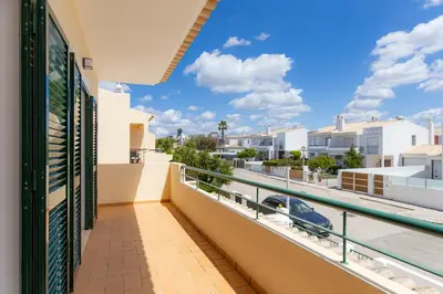 a balcony with a view of the street at Spacious Villa - Walk to Beach & City Center in Lagos