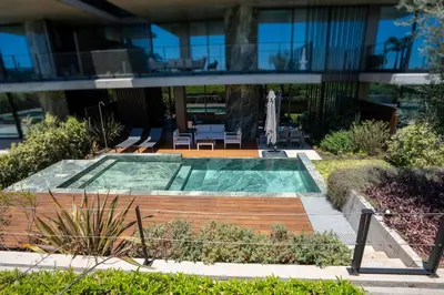 a swimming pool in the middle of a building at Cloud9 by LovelyStay in Funchal