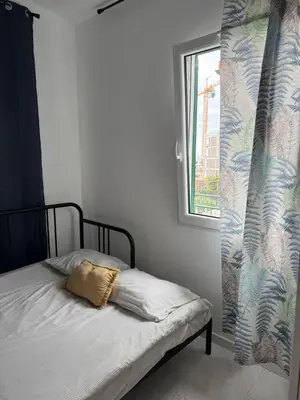 a room with a bed and a desk and a chair at Sunrise Valley in Machico