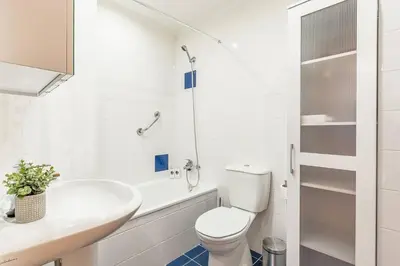 a white desk in a bedroom with a bed at Sapphire Scape Assomada Madeira by GRM in Bicas