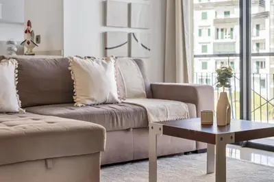 a living room with a couch and a coffee table at Forum Ocean View 5C by Homie in Funchal