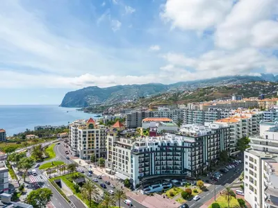an aerial view of a city and the ocean at Forum Ocean View 5C by Homie in Funchal