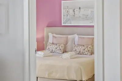 a bedroom with a bed with two towels on it at Forum Ocean View 5C by Homie in Funchal
