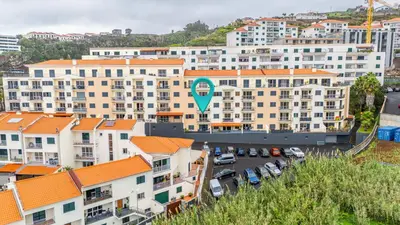 an aerial view of a city with buildings at Ti Clara in Caniço